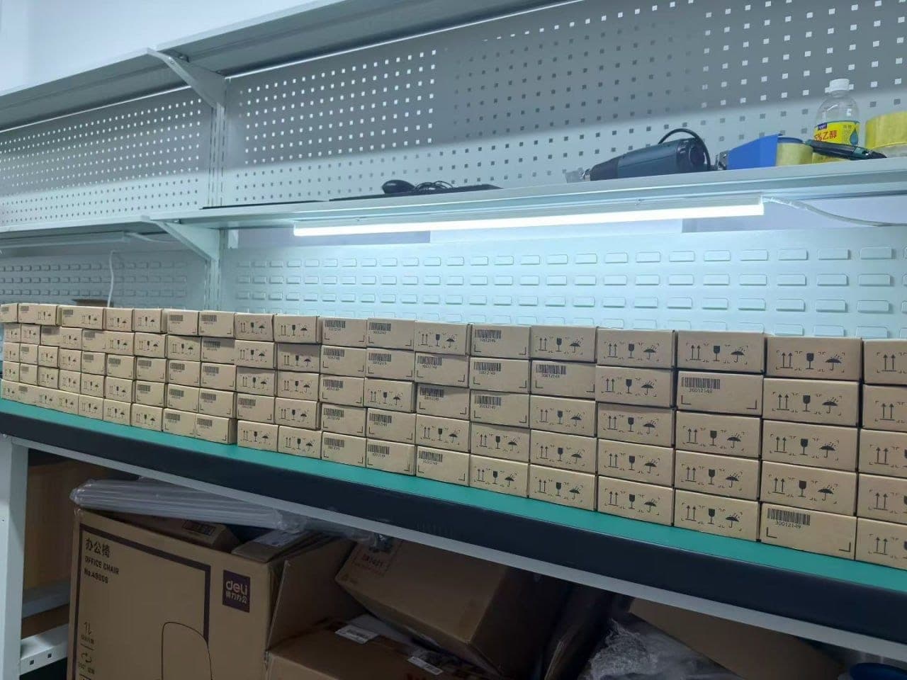 Qingzhi Computer warehouse, packed server-component boxes on shelving