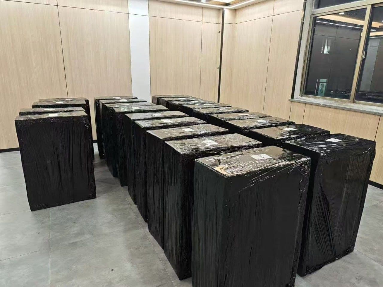 Qingzhi Computer warehouse, shrink-wrapped server pallets ready for export